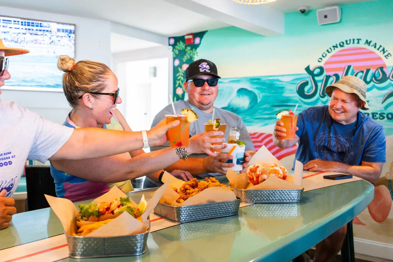 people cheers with beer at splash
