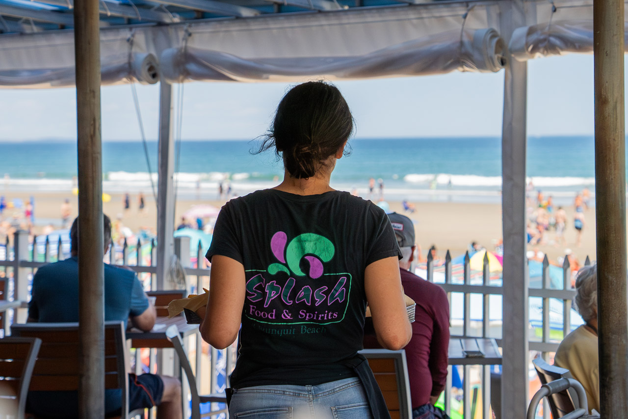 server with food outdoor deck